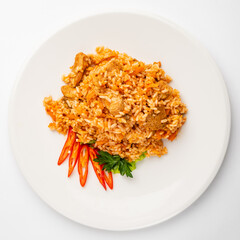 rice pilaf with meat, carrot and onion isolated on white background