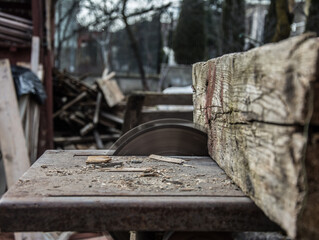 Carpenter's Hands Cutting Wood With Tablesaw