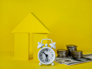 Watch, calculator, house, coins, and banknotes. The idea of business, Finance concept, saving money...