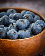 Freshly picked organic blueberries. Rustic style syill life. Healthy eating and nutrition.