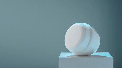 Laying lotion cream container on white platform with copy space under blue light