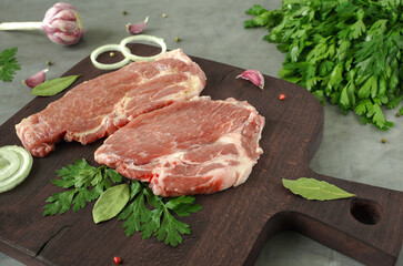 raw meat on a wooden board