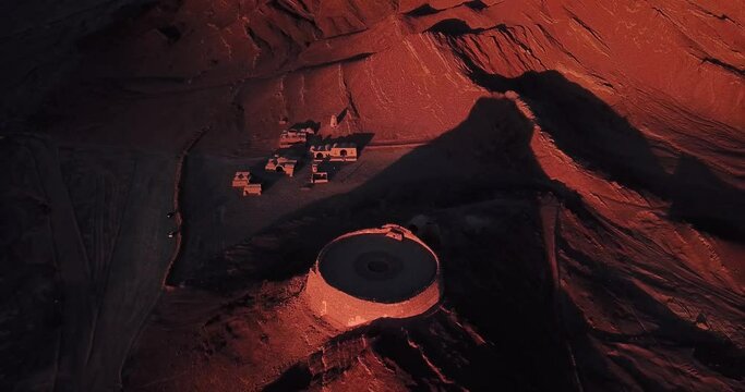 Birdseye Aerial View of Scenic Circle Architecture Building an Old ancient Construction for Burial Death People to Decay Carrion Bodies Eaten by Vulture Birds Near the Ruins of Adobe Mudbrick Houses