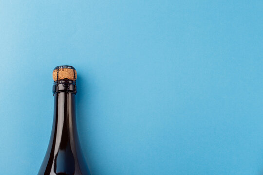 bottle of champagne on a blue background