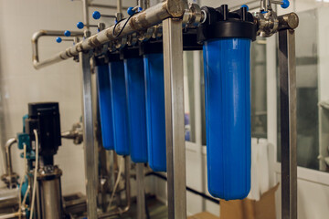 Water purification filter equipment in plant workshop.