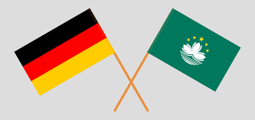 Crossed flags of Germany and Macau. Official colors. Correct proportion