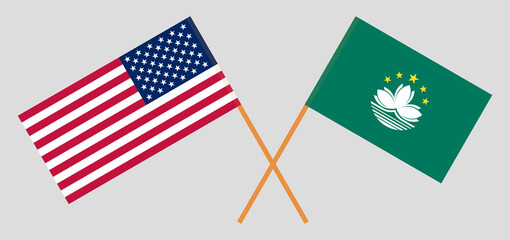Crossed flags of the USA and Macau. Official colors. Correct proportion
