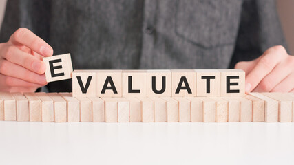 the word of EVALUATE on building blocks concept