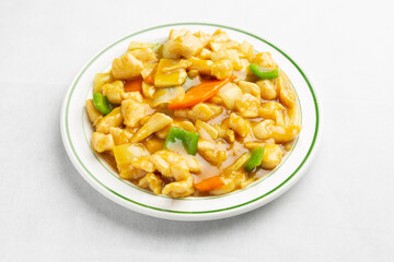 close up of chicken in Chinese style curry sauce