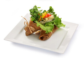 Vegetarian wraps on a white plate