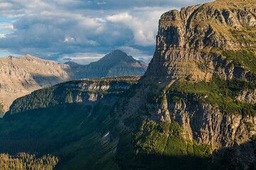 dramatic summer mountain ranges and mountain peaks in the vast Glacier National Park in Montana.