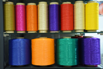 Multicolored bobbin thread. Set of sewing thread coils, miscellaneous colours. Polypropylene multifilament yarns.