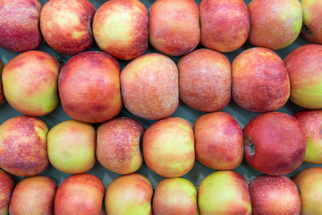 ripe apples close-up on the shelves of stores