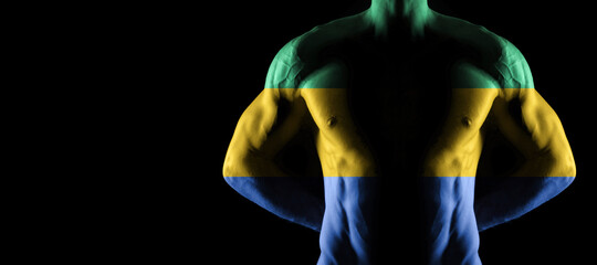 Gabon flag on muscled male torso with abs