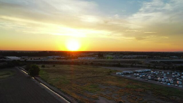 Beautiful Aerial Pan View of the Sun Setting in Fresno Valley California - Part 2