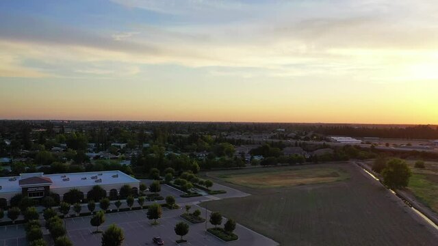 Beautiful Aerial Pan View of the Sun Setting in Fresno Valley California