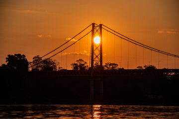 Fototapeta na wymiar golden gate bridge at sunset Madre de dios - Perú