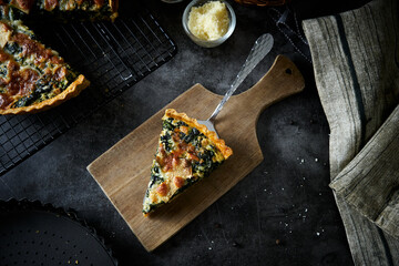 Delicious Homemade cheesy spinach quiche pie.