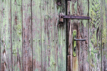 Close up shot of a texture of an old wooden door