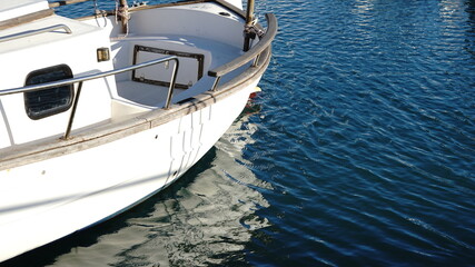 reflection of small boat in the harbor
