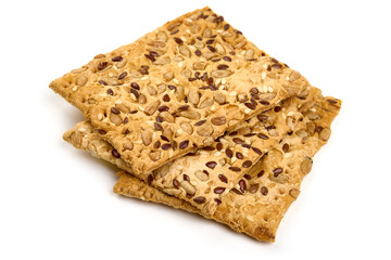 Crispy bread with sesame and flax seeds, crackers, isolated on white background. High resolution image