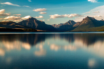 dramatic, peaceful and  serene summer  sunset photo of Lake McDonald in Glacier National Park in. Montana.