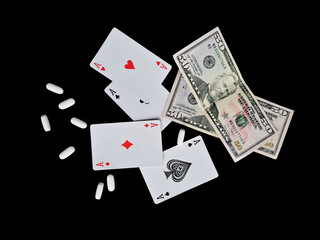 Poker and money. Composition from cards. Money games. Card games. Dollars on black background