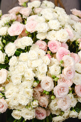 A large bouquet of white and pink roses close-up.