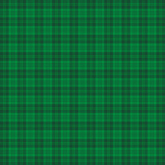 St. Patricks day tartan plaid. Scottish pattern in green and dark green cage. Scottish cage. Traditional Scottish checkered background. Seamless fabric texture. Vector illustration