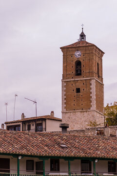 Tower of reloj in Chinchon, Madrid, Spain is a mix of gothic renaissanceist and baroque Spanish traditional architecture example.
