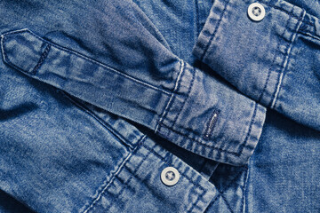 Blue denim clothing top view background - 419504541