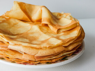 a stack  of pancakes on a plate, carnival