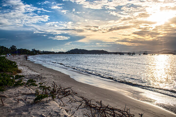 sunset over the sea  in the background, located on the beach of Cachoeira do Bom Jesus, Canasvieras, Ponta das Canas, Florianopolis, Santa Catarina, Brazil 