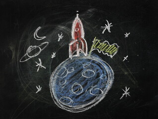 Rocket spaceship with space background and planets and stars, drawn chalk on black chalkboard, blackboard background and texture 