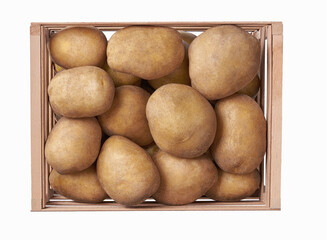 fresh raw potatoes in a wooden box isolated on white background. Top view.