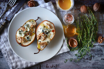Baked pears with cheese and nuts in a frying pan. Keto is friendly.