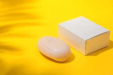 Creative mock-up layout made of soap and box on the table. Homemade flat lay concept.