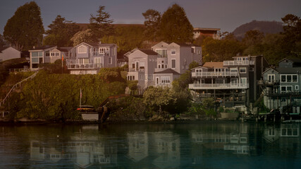 Fototapeta premium Lakeside views of homes on the water front in a small town in Northern California