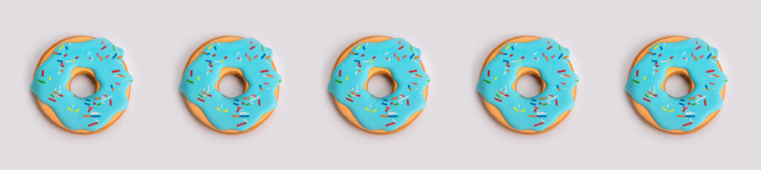colorful donut on light grey background. Minimal food concept