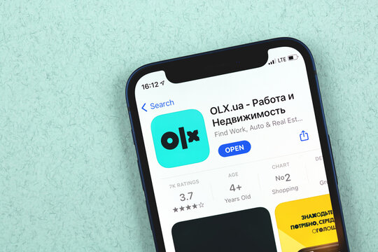 Kharkov, Ukraine - March 9, 2021: close up of OLX app displayed on mobile phone screen, logotype