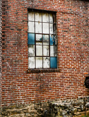 Broken windows of abandoned building