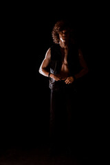 Obraz na płótnie Canvas Young man with curly afro hiar