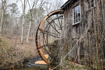 Historic and abandoned saw mill on the river
