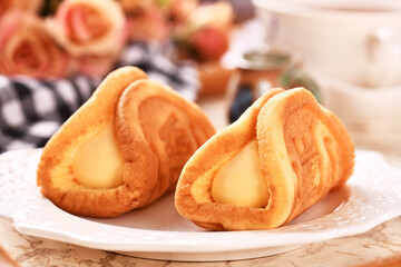 Cream waffles on white plate   