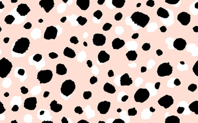 Abstract modern leopard seamless pattern. Animals trendy background. Beige and black decorative vector stock illustration for print, card, postcard, fabric, textile. Modern ornament of stylized skin