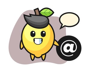 Cartoon illustration of lemon standing beside the At symbol