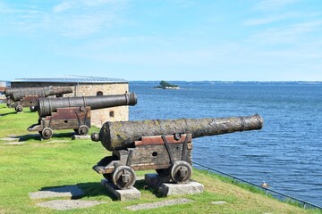 View from the wall Kalmar castle, Sweden. Ancient cannon aimed to the sea. © PRANGKUL