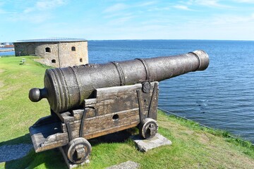 View from the wall Kalmar castle, Sweden. Ancient cannon aimed to the sea.