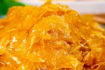 Close up Pile of dried mango sheet, thai street food market