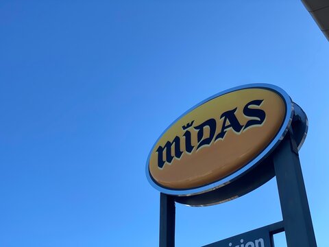 Saint denis, Ile de La R&eacute;union France - March 10 2021: Yellow midas sign automobile repair company